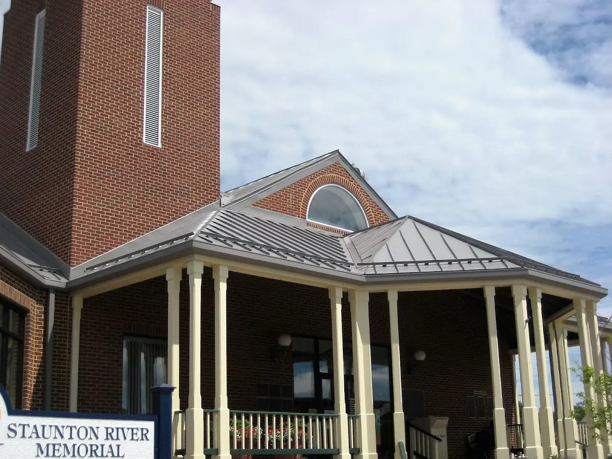 Skilled roofing craftsmen working on a residential roof in Middleborough